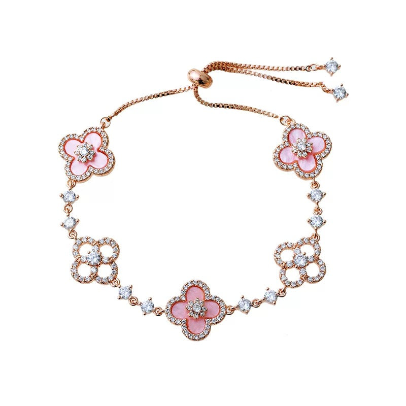 Exquisite natural pink mother of pearl hollow lucky clover pull-out bracelet.