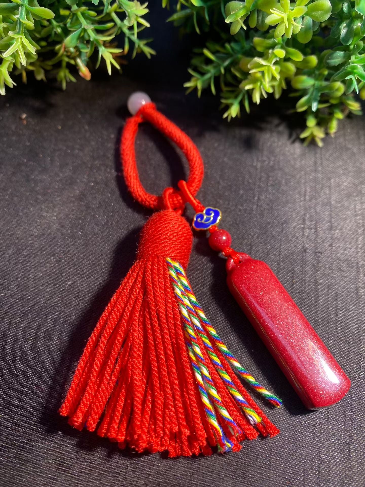 Natural cinnabar keychain bag hanging.