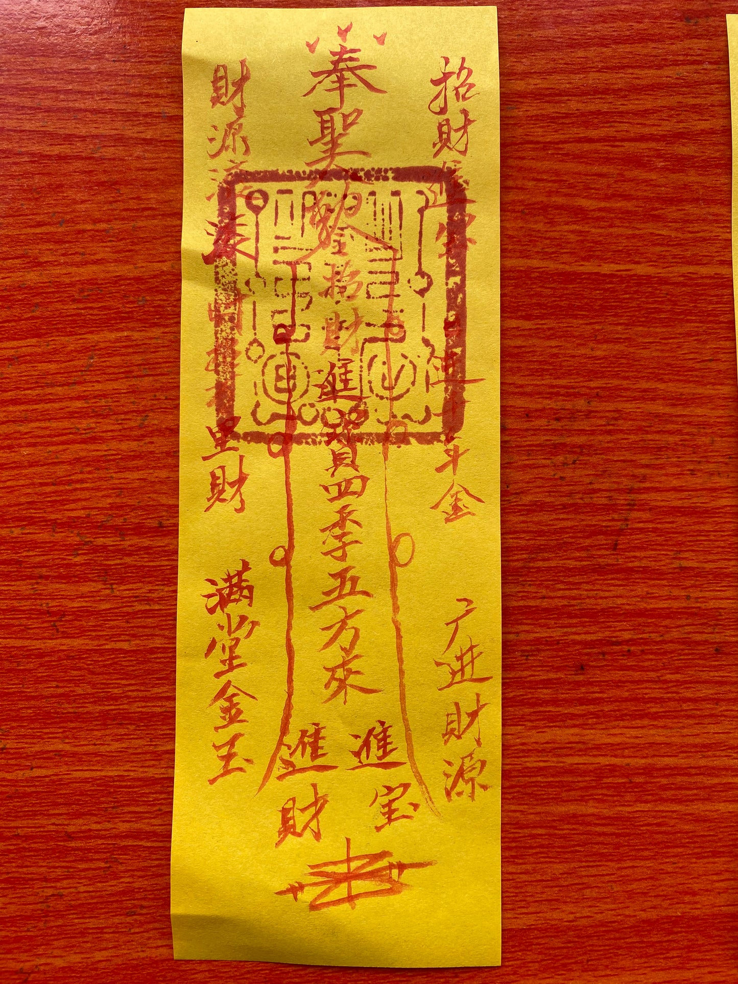 Master Dao hand-painted cinnabar, talismans and wealth charms to ensure safety and attract wealth.