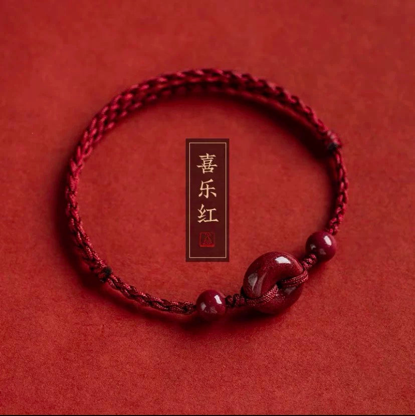 Cinnabar zodiac year safety buckle handmade woven rope.
