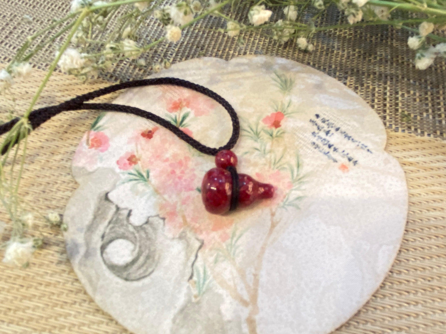 Cinnabar crystal sand gourd pendant