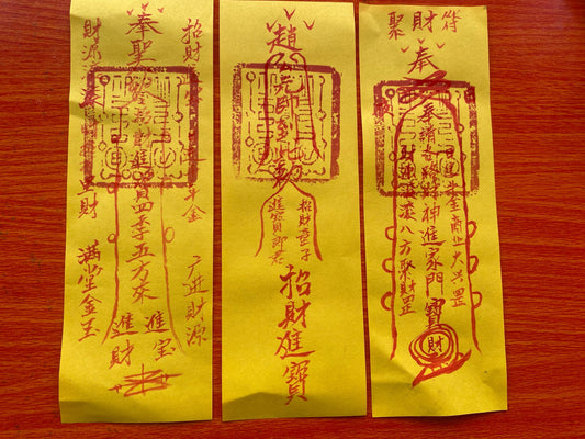 Master Dao hand-painted cinnabar, talismans and wealth charms to ensure safety and attract wealth.