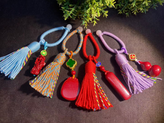 Natural cinnabar keychain bag hanging.