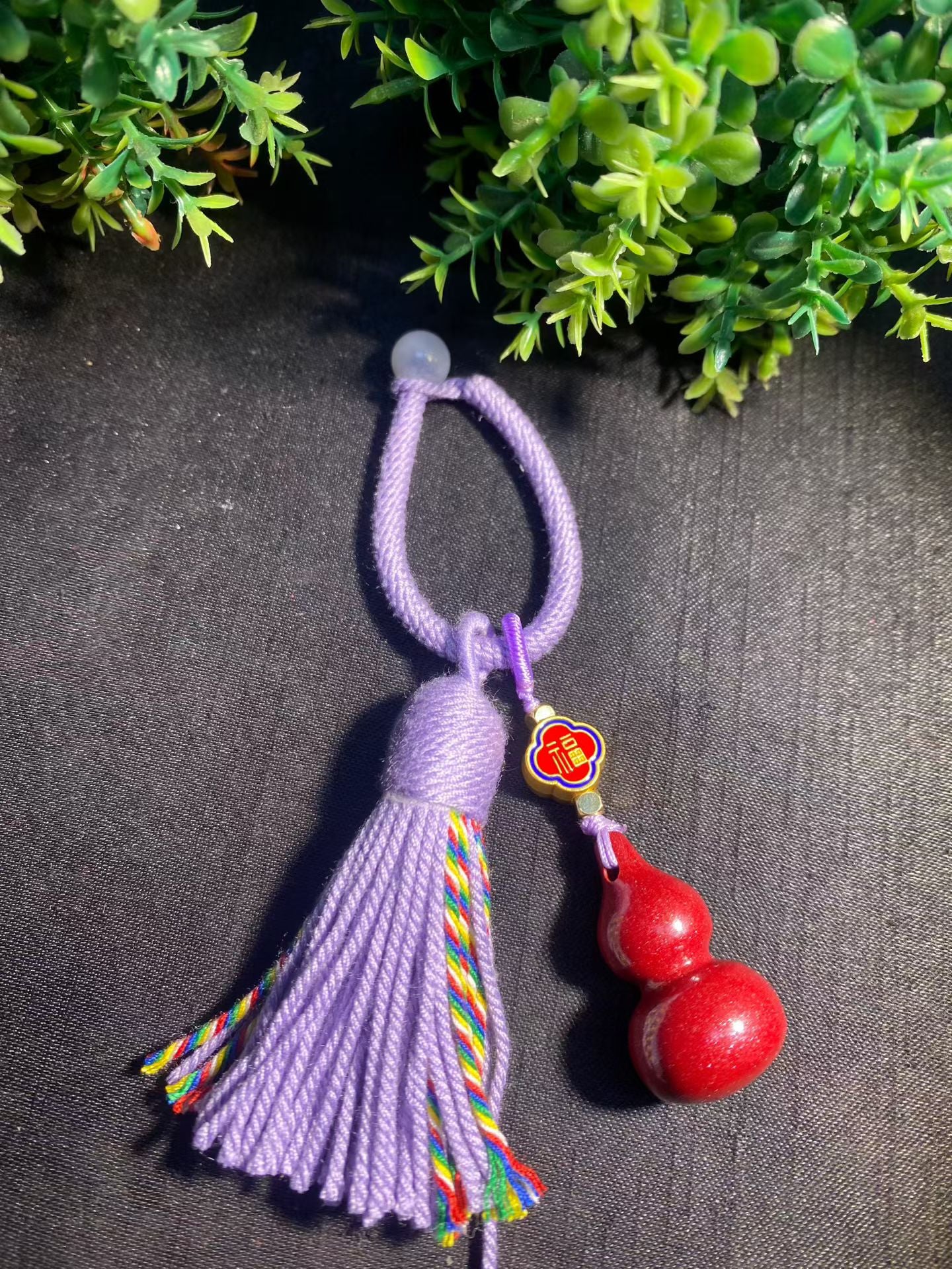 Natural cinnabar keychain bag hanging.